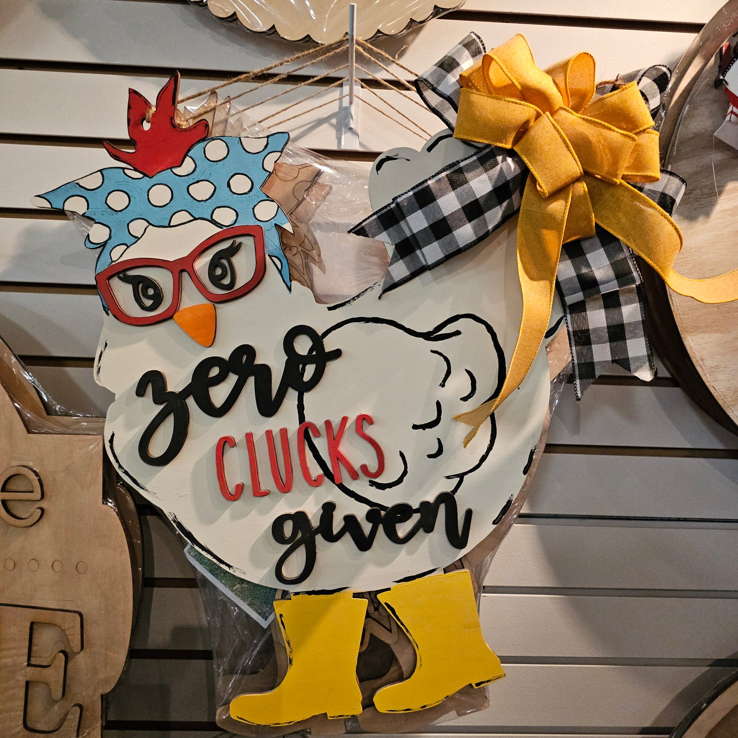 Zero Clucks Given Door Hanger