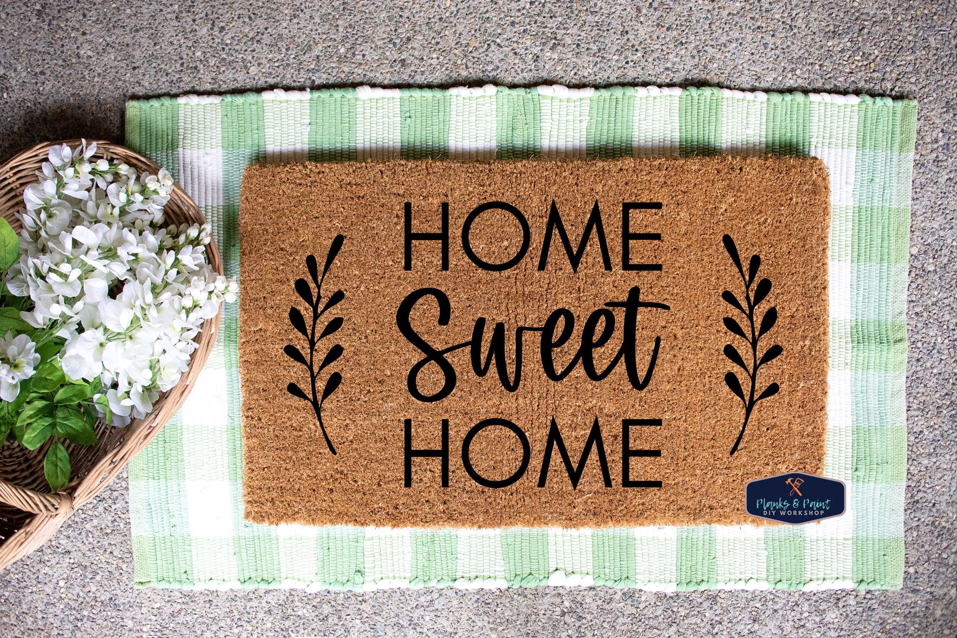 Home Sweet Home Welcome Mat At Custom Front Door of House., Stock image